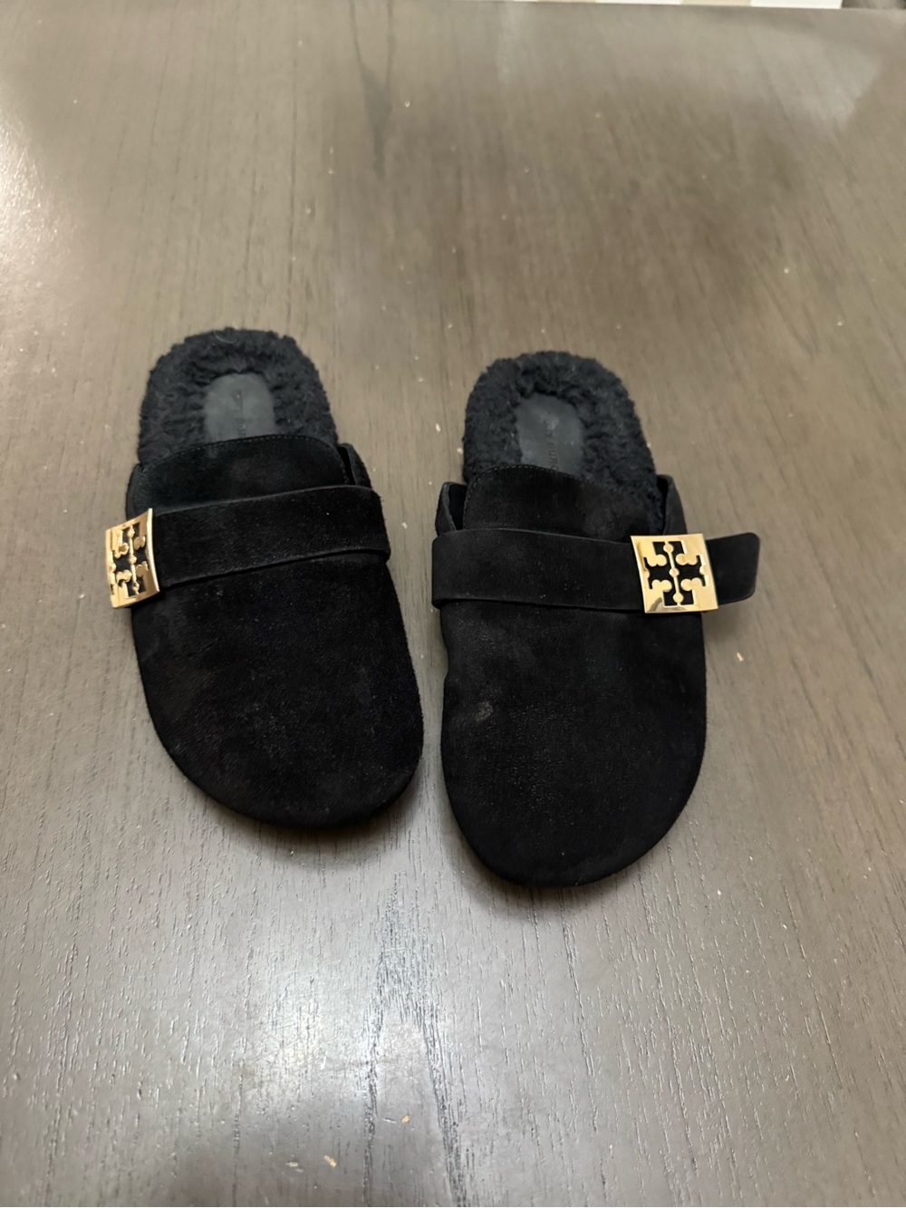 Tory Burch mellow shearling Black Suede Slip-On Mules with Gold Logo Accent